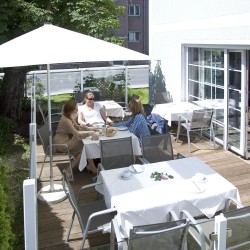 Terrasse beim Grünen Hotel zur Post in Salzburg